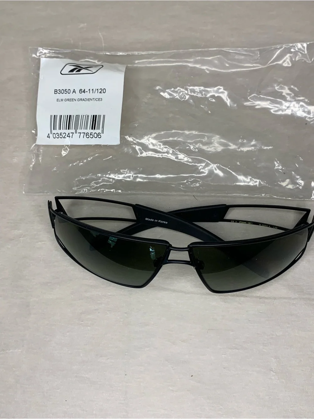 Reebok Black Men's Sunglasses in with Elm Green Gradient Lenses